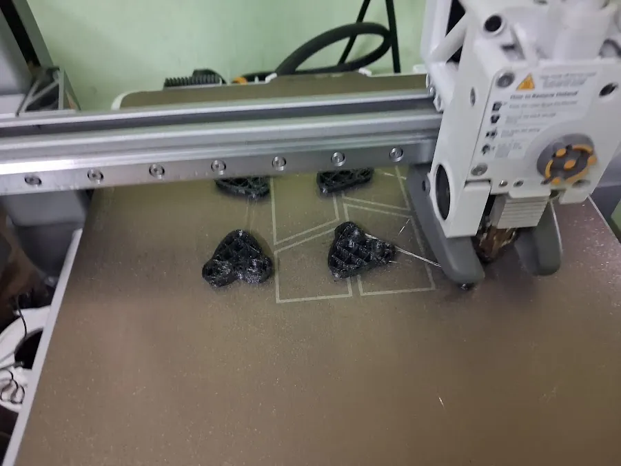 3D printed parts on the printer bed