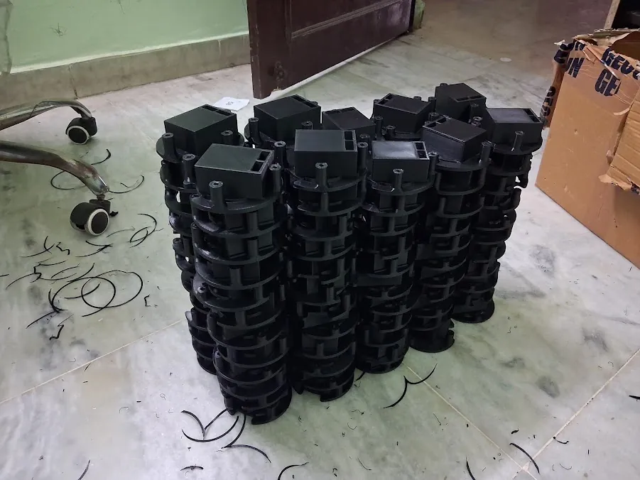 Production batch of black 3D printed components