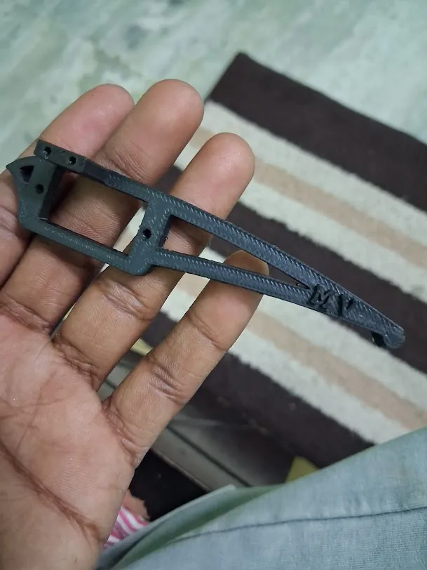 Long black 3D printed prototype arm
